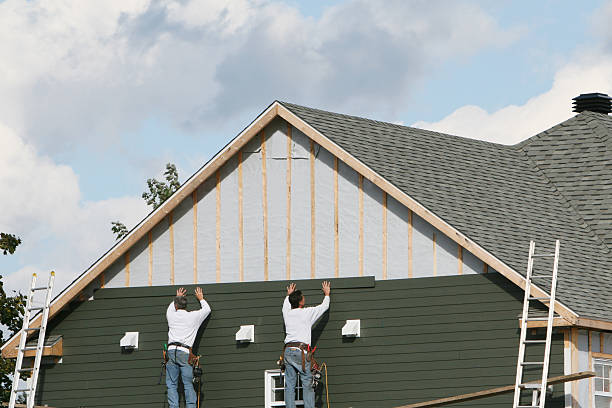 Professional Siding Contractor technician working in Bethesda, MD